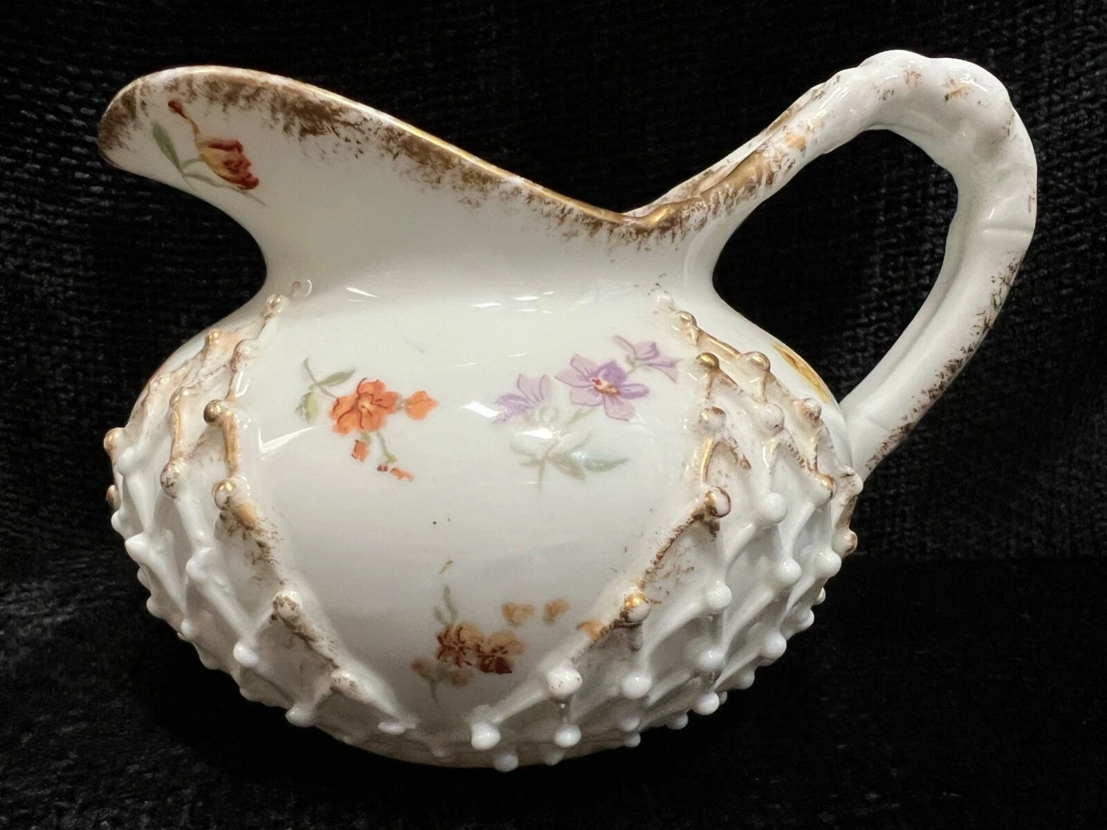 Lotus Ware — floral pitcher