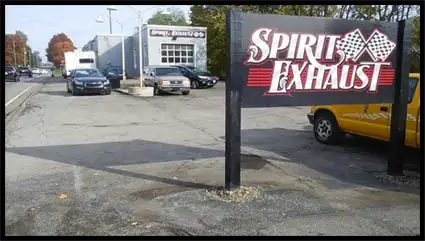 Spirit Exhaust sign and shop; capture date unknown